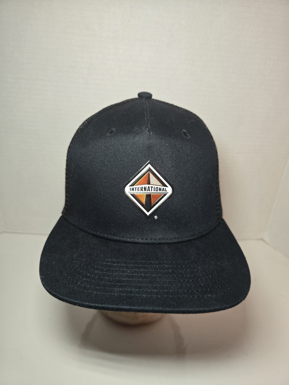 International Black Snapback with Logo Patch